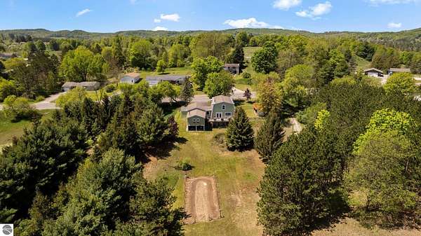 1.6 Acres of Land with Home for Sale in Cedar, Michigan