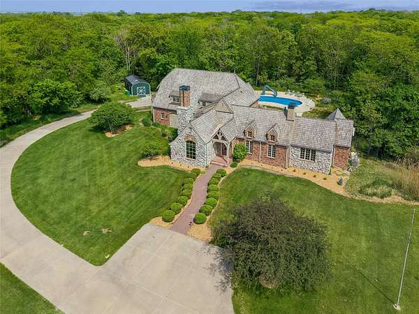 4.84 Acres of Land with Home for Sale in Adel, Iowa