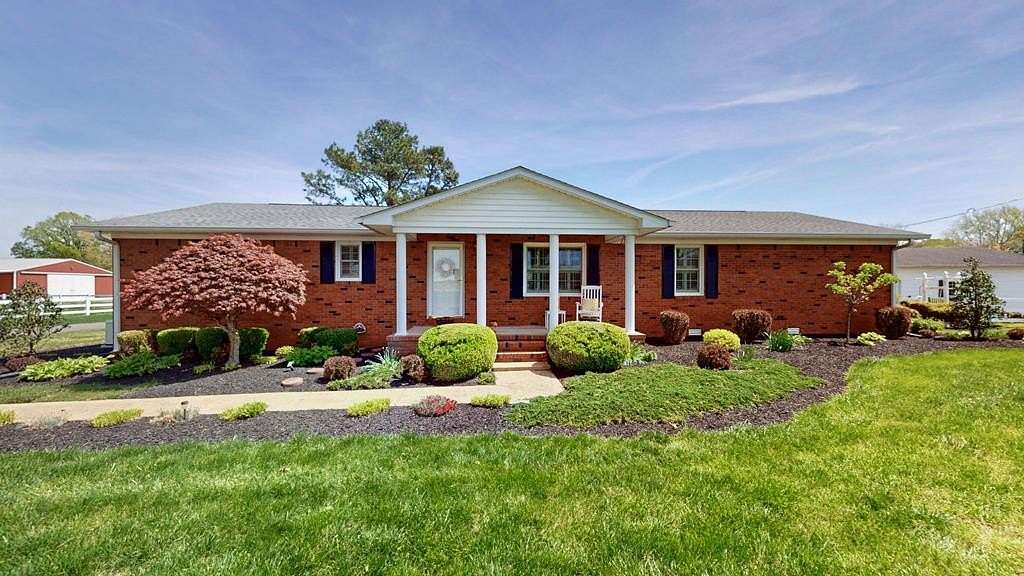 15.1 Acres of Land with Home for Sale in Cottage Grove, Tennessee