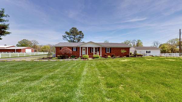 15 Acres of Land with Home for Sale in Cottage Grove, Tennessee