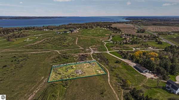0.59 Acres of Residential Land for Sale in Williamsburg, Michigan