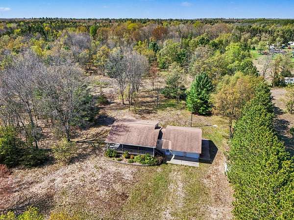 10 Acres of Land with Home for Sale in Free Soil, Michigan