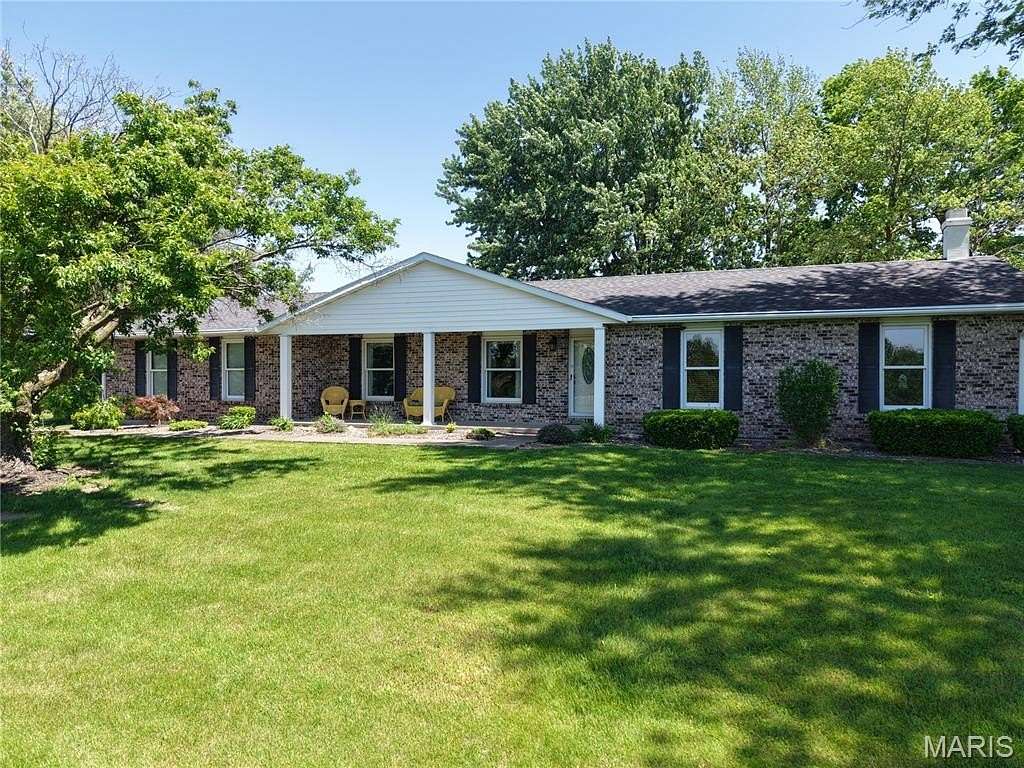 20.9 Acres of Agricultural Land with Home for Sale in New London, Missouri