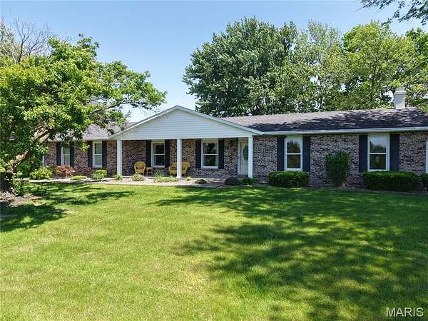 20.9 Acres of Agricultural Land with Home for Sale in New London, Missouri