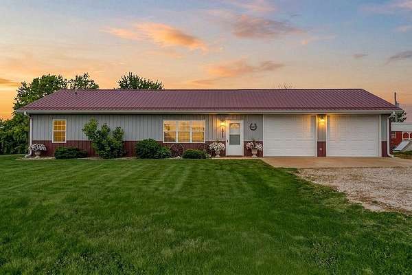 30.9 Acres of Land with Home for Sale in Odessa, Missouri