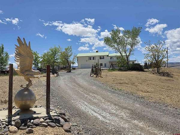 6.19 Acres of Land with Home for Sale in Delta, Colorado