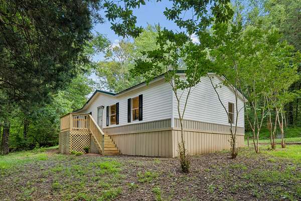 7.6 Acres of Land with Home for Sale in Gordonsville, Tennessee