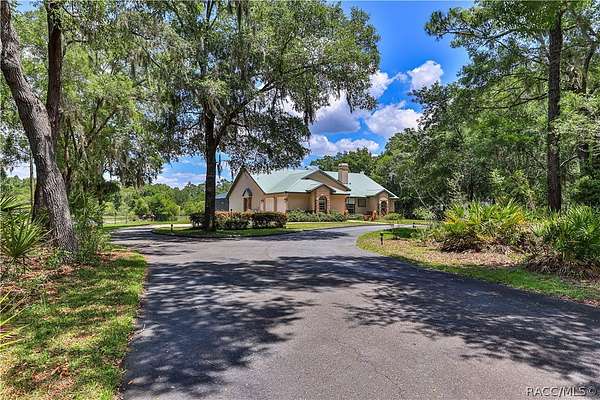 7.58 Acres of Land with Home for Sale in Crystal River, Florida