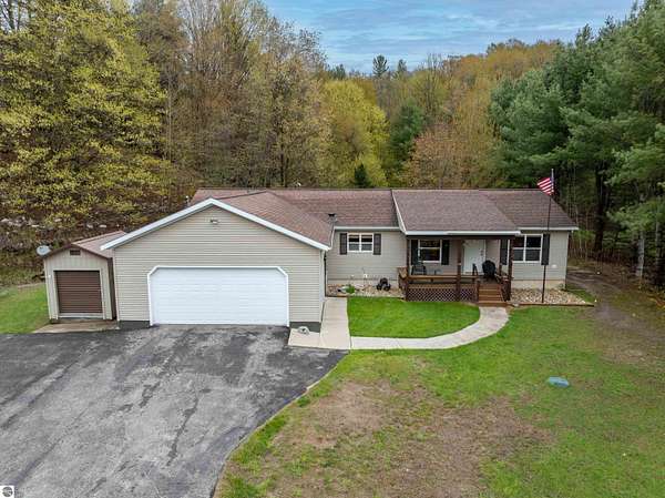 4.15 Acres of Land with Home for Sale in Central Lake, Michigan