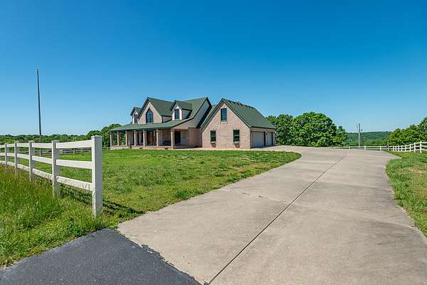 40 Acres of Land with Home for Sale in Galena, Missouri
