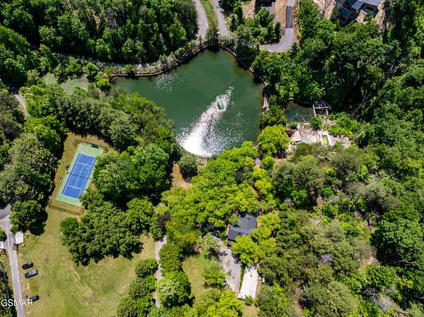 25.1 Acres of Recreational Land with Home for Sale in Sevierville, Tennessee