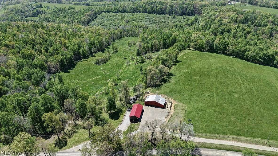 58.6 Acres of Recreational Land with Home for Auction in Warsaw, Ohio