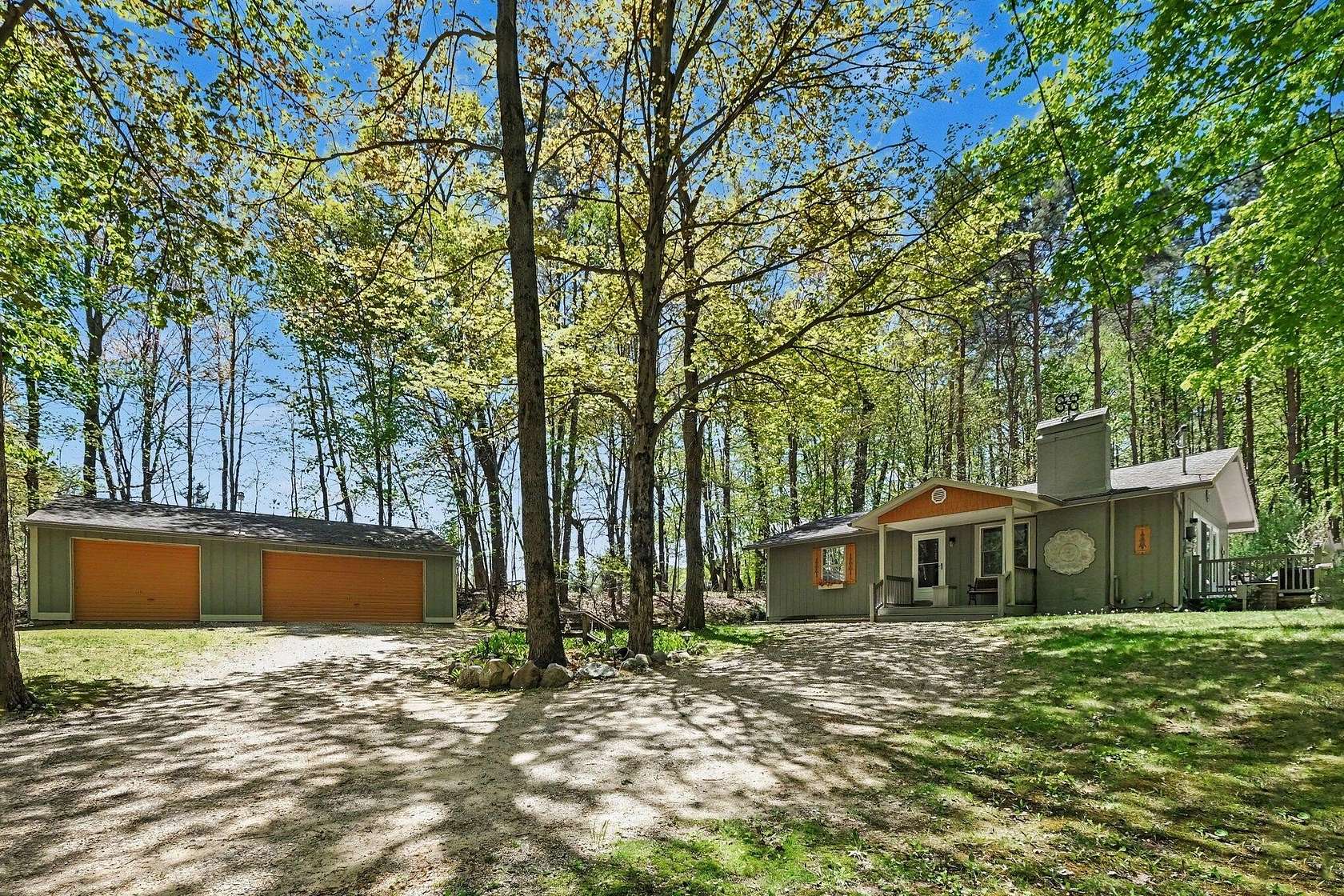2.24 Acres of Land with Home for Sale in Rockford, Michigan