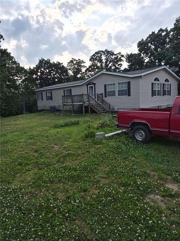 13.8 Acres of Land with Home for Sale in Cross Timbers, Missouri