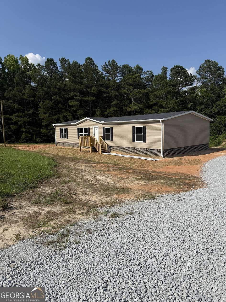 1.5 Acres of Land with Home for Sale in Elberton, Georgia