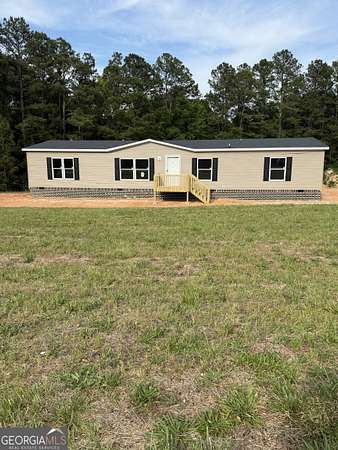 1.5 Acres of Land with Home for Sale in Elberton, Georgia