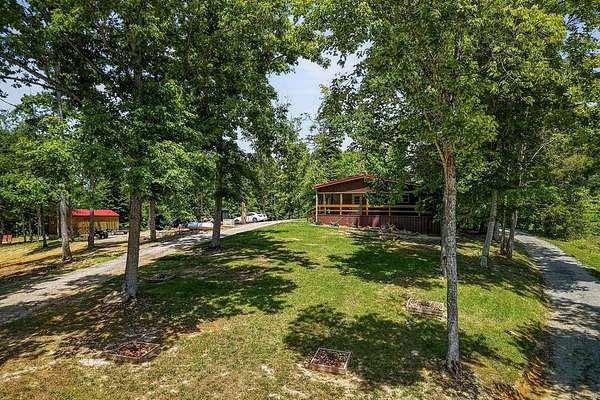 14.2 Acres of Land with Home for Sale in Allons, Tennessee