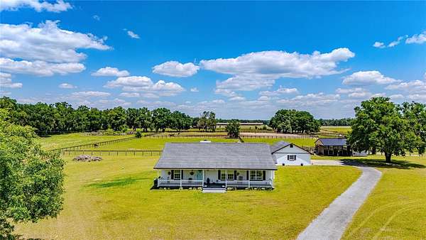 5.66 Acres of Land with Home for Sale in Citra, Florida