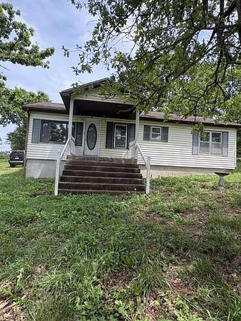 4.3 Acres of Land with Home for Sale in Windyville, Missouri
