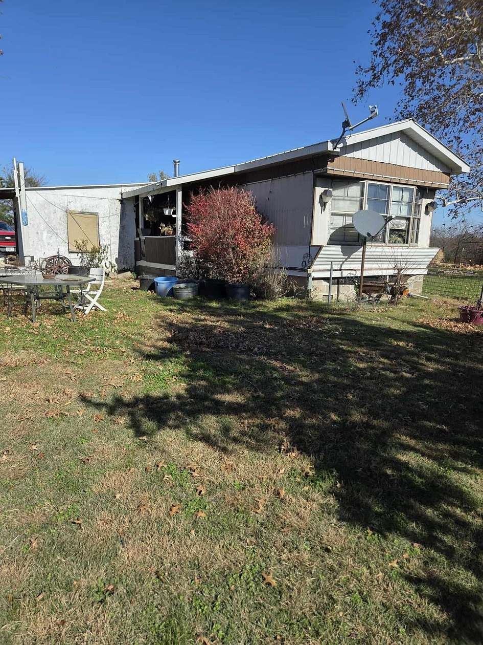 13.8 Acres of Land with Home for Sale in Tunas, Missouri