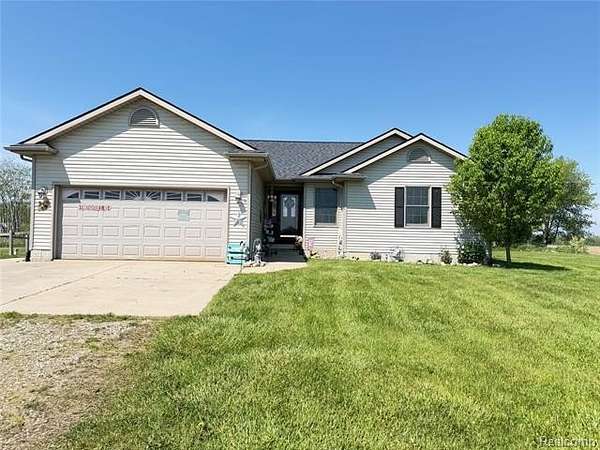 2.5 Acres of Land with Home for Sale in Burns Township, Michigan