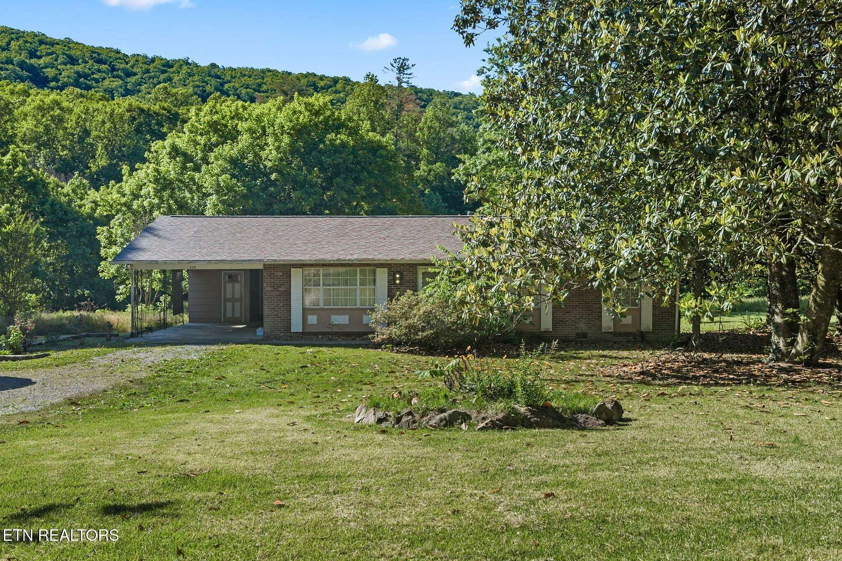 4.54 Acres of Land with Home for Sale in Oliver Springs, Tennessee