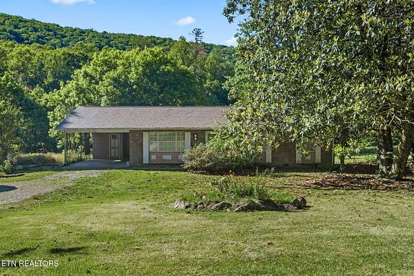 4.54 Acres of Land with Home for Sale in Oliver Springs, Tennessee