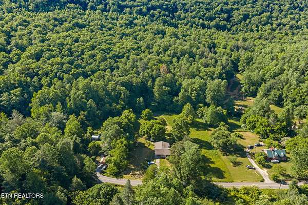4.54 Acres of Land with Home for Sale in Oliver Springs, Tennessee