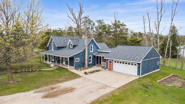 2.73 Acres of Land with Home for Sale in Elmira, Michigan