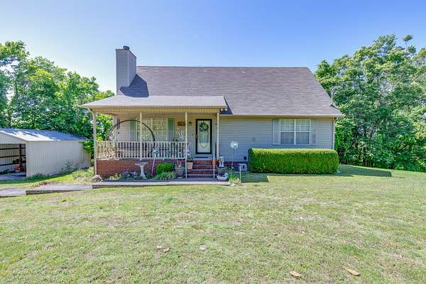 5 Acres of Land with Home for Sale in Mount Pleasant, Tennessee
