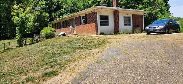 5.17 Acres of Land with Home for Sale in Lenoir, North Carolina