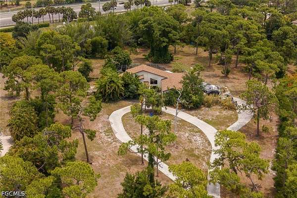 2.84 Acres of Land with Home for Sale in Fort Myers, Florida