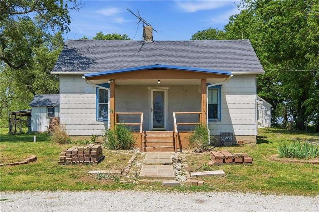 13.8 Acres of Land with Home for Sale in Edgerton, Missouri