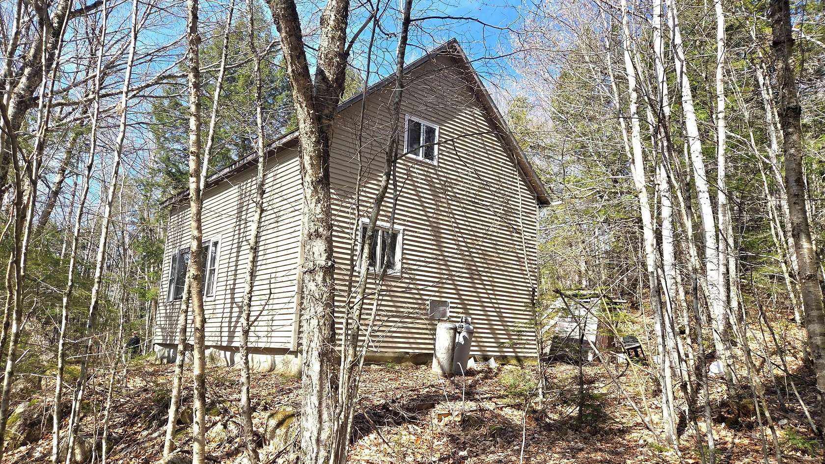 22.8 Acres of Recreational Land with Home for Sale in Lakeville Town, Maine