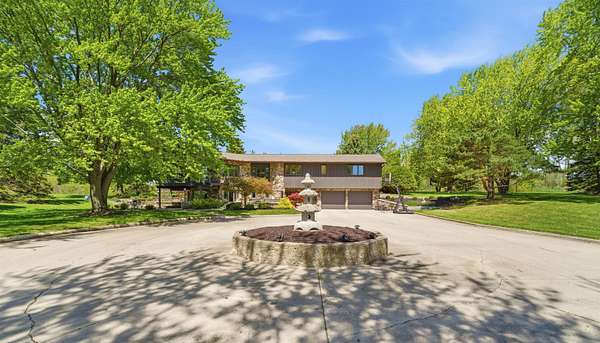 7.29 Acres of Land with Home for Sale in Hilbert, Wisconsin