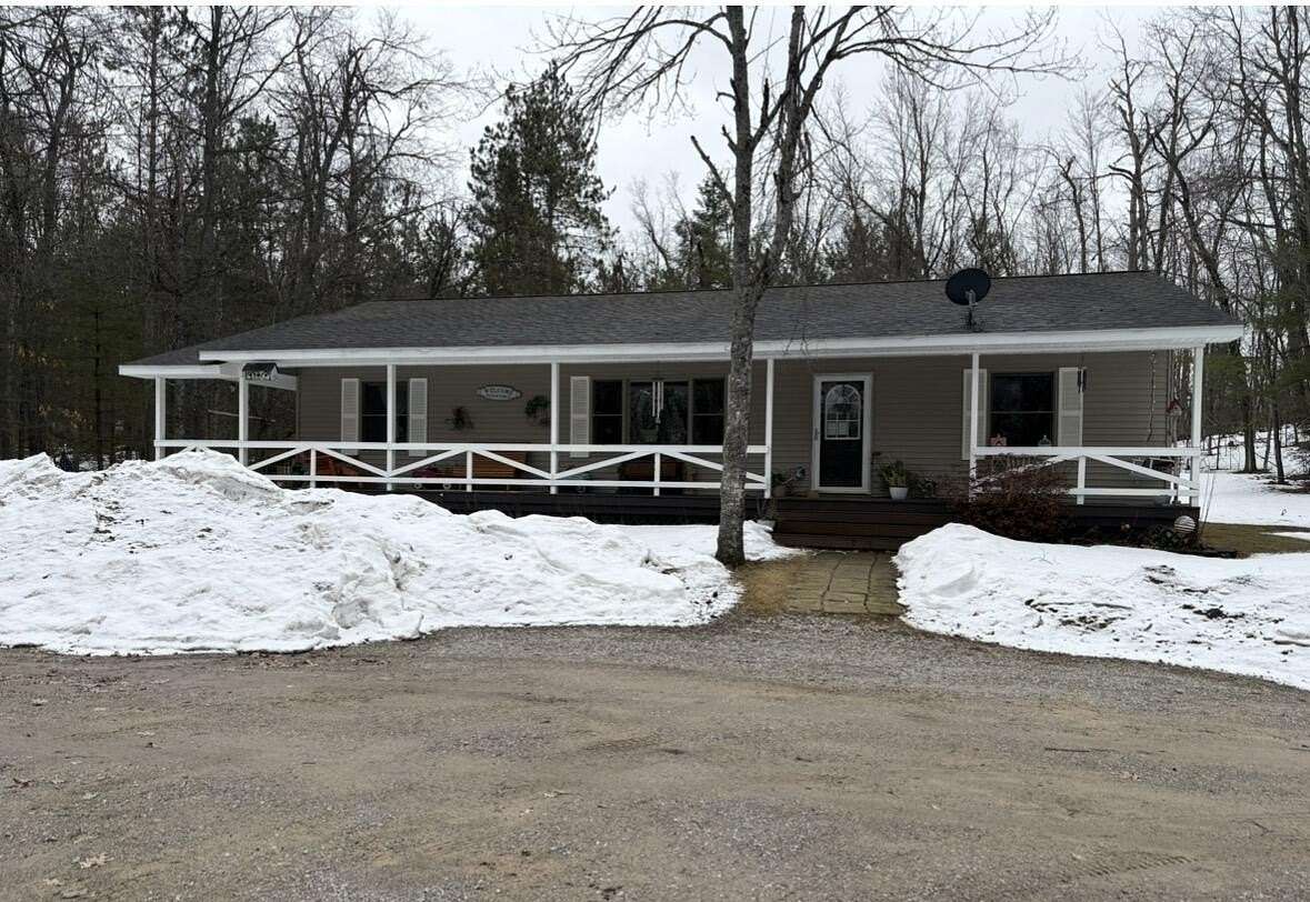 10 Acres of Recreational Land with Home for Sale in Hillman, Michigan