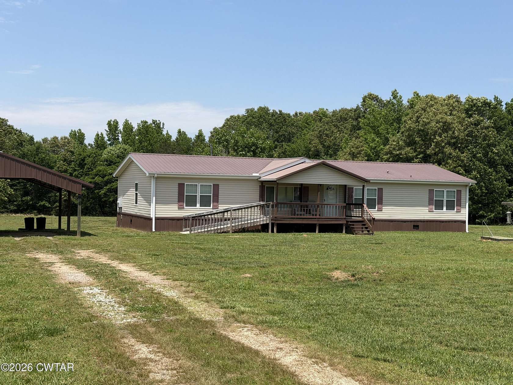 10.4 Acres of Land with Home for Sale in Jacks Creek, Tennessee