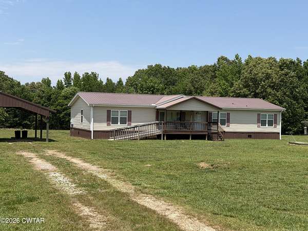 10.4 Acres of Land with Home for Sale in Jacks Creek, Tennessee