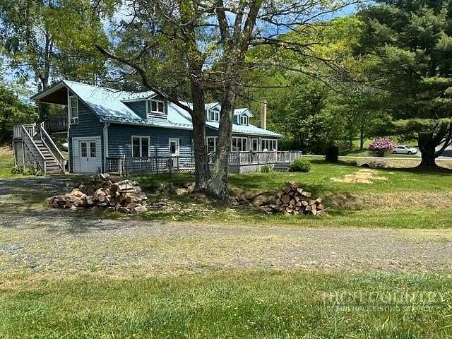 48.3 Acres of Land with Home for Sale in Lansing, North Carolina