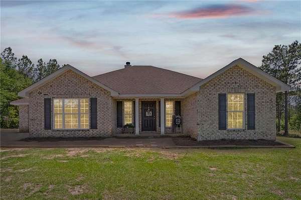 16.3 Acres of Land with Home for Sale in Citronelle, Alabama