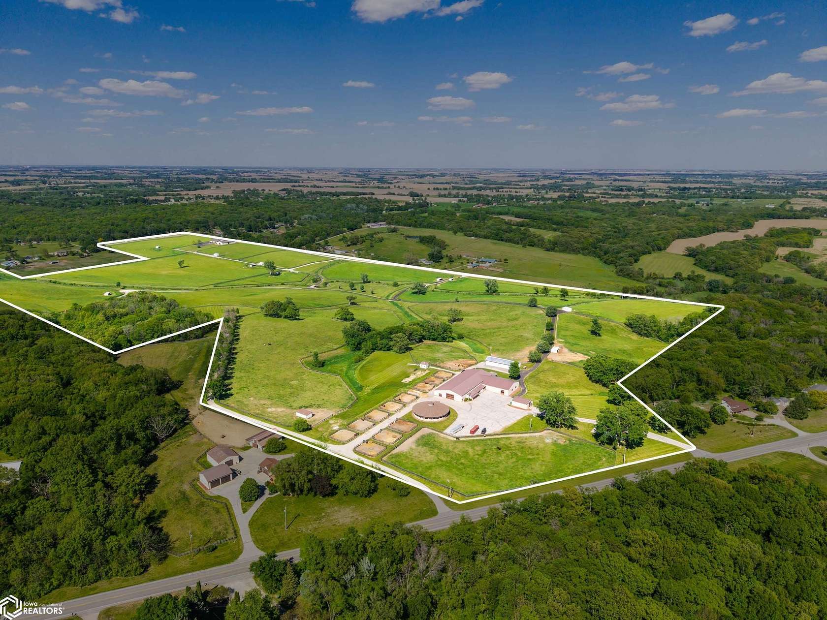 168 Acres of Agricultural Land with Home for Sale in Runnells, Iowa