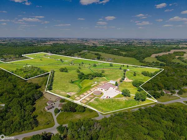 168 Acres of Agricultural Land with Home for Sale in Runnells, Iowa