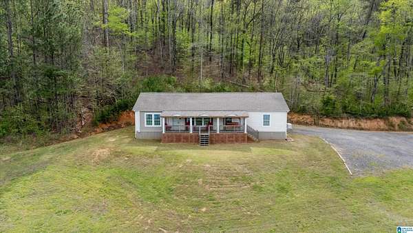 15.7 Acres of Land with Home for Sale in Morris, Alabama