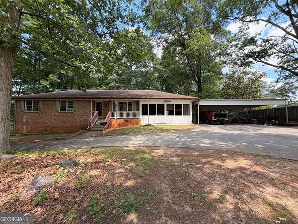 5 Acres of Land with Home for Sale in Conyers, Georgia