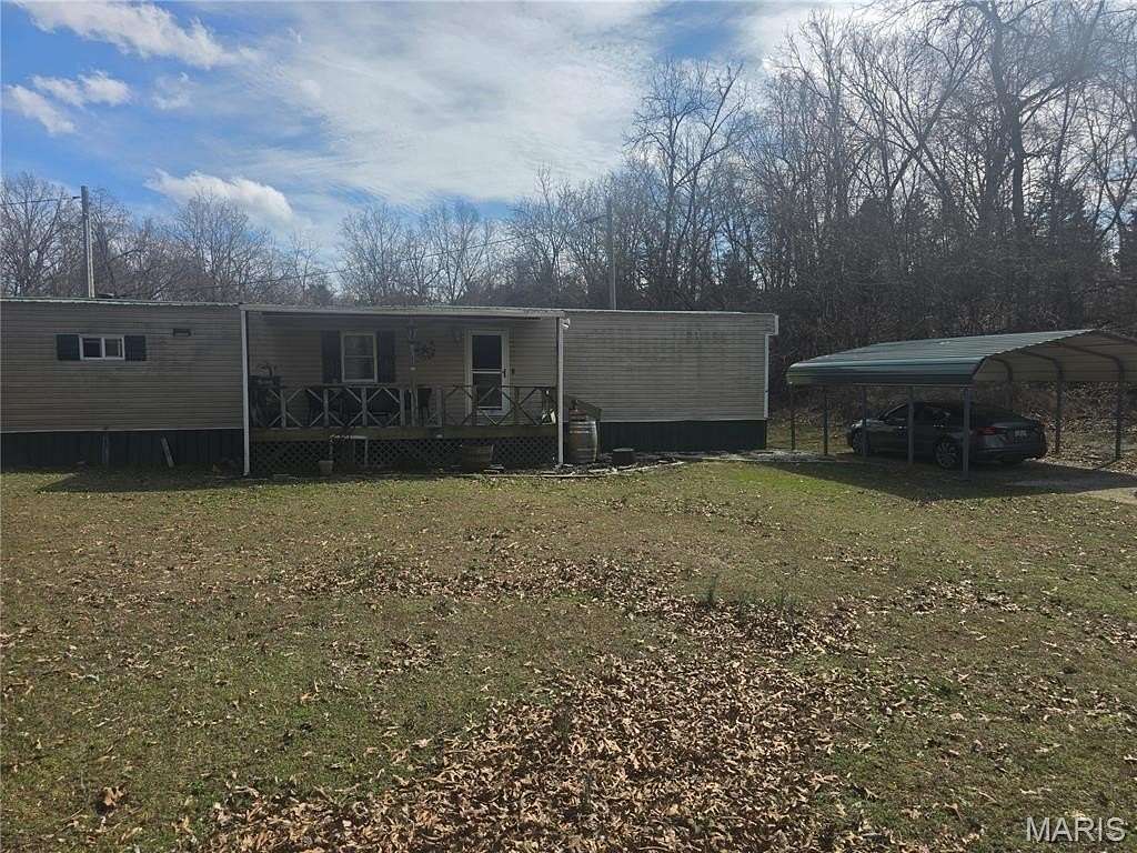 4.9 Acres of Land with Home for Sale in Waynesville, Missouri