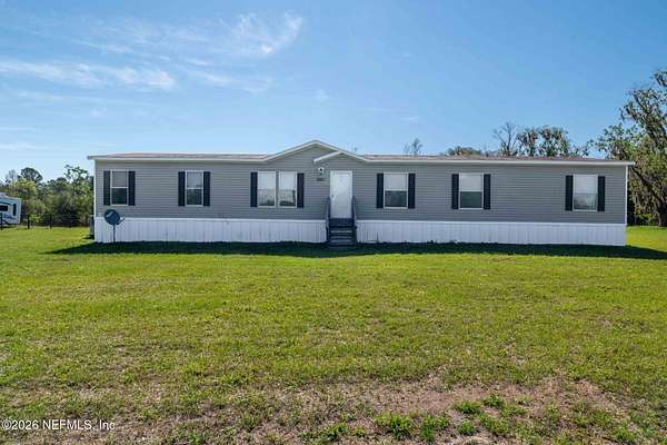 1.65 Acres of Land with Home for Sale in Lake Butler, Florida