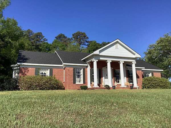 6.8 Acres of Land with Home for Sale in Philadelphia, Mississippi