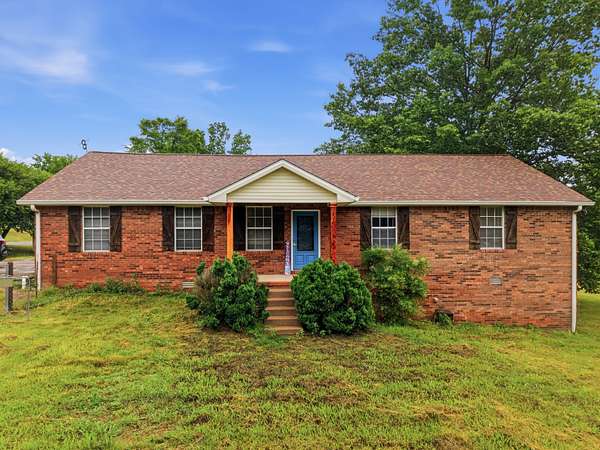 14 Acres of Land with Home for Sale in Brush Creek, Tennessee
