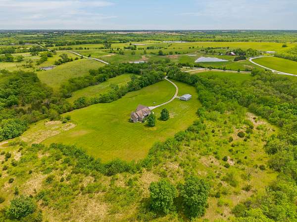 80 Acres of Land with Home for Sale in Kingston, Missouri