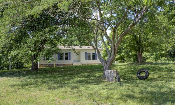 1.59 Acres of Land with Home for Sale in Woodlawn, Tennessee